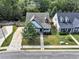 Two-story home with manicured lawn, large driveway and charming front facade at 275 Creek View Ln, Acworth, GA 30102