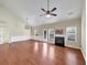 Expansive living room boasting a vaulted ceiling, fireplace, and hardwood floors at 275 Creek View Ln, Acworth, GA 30102