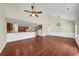 Hardwood floors highlight the open layout of the living room to kitchen and staircase at 275 Creek View Ln, Acworth, GA 30102