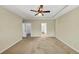 Spacious main bedroom featuring carpeted floors, recessed lighting, and multiple closets at 275 Creek View Ln, Acworth, GA 30102