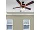 Detail of a ceiling fan in main bedroom with two windows and light walls at 275 Creek View Ln, Acworth, GA 30102