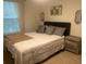 Cozy bedroom featuring a plush bed, soft lighting, and a calming ambiance at 4191 Spring Valley Cir, Tucker, GA 30084