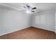 Spacious bedroom with tile flooring and ceiling fan at 561 Congress Pkwy, Lawrenceville, GA 30044