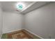 Bright bedroom featuring tile flooring and unique light fixture at 561 Congress Pkwy, Lawrenceville, GA 30044