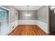 Simple dining room with hardwood floors and neutral walls at 561 Congress Pkwy, Lawrenceville, GA 30044