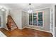 Spacious dining area with hardwood floors and large windows at 561 Congress Pkwy, Lawrenceville, GA 30044