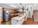 Granite countertop kitchen with stainless steel appliances at 561 Congress Pkwy, Lawrenceville, GA 30044