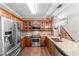 Stainless steel appliances and granite countertops in this kitchen at 561 Congress Pkwy, Lawrenceville, GA 30044