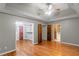 Bright main bedroom with hardwood floors and access to a large closet and bathroom at 561 Congress Pkwy, Lawrenceville, GA 30044