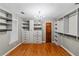 Large walk-in closet with ample shelving and drawers at 561 Congress Pkwy, Lawrenceville, GA 30044