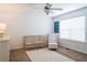 Bright Bedroom with wood crib, soft rug, neutral colors, and natural light from a window at 4826 Liberty Plz, Acworth, GA 30101