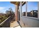 Balcony overlooking foliage with brick and stucco walls at 640 Glen Iris Ne Dr # 515, Atlanta, GA 30308