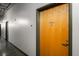 Hallway with wooden door leading to unit 515 at 640 Glen Iris Ne Dr # 515, Atlanta, GA 30308