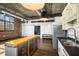 Kitchen with stainless steel appliances and rolling island at 640 Glen Iris Ne Dr # 515, Atlanta, GA 30308