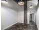 Open living room with concrete floors, exposed ceiling, and modern lighting fixtures at 640 Glen Iris Ne Dr # 515, Atlanta, GA 30308
