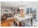 Bright dining area with a large table and access to a deck at 7483 Pleasant Hill Rd, Lithonia, GA 30058