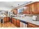 Modern kitchen with granite countertops and stainless steel appliances at 7483 Pleasant Hill Rd, Lithonia, GA 30058