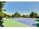 The community offers well-maintained tennis courts with blue and green surfaces at 2224 Snug Ne Hbr, Marietta, GA 30066