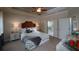 Spacious bedroom with plush carpeting and en-suite bathroom access at 2531 High Brow St # 41, Duluth, GA 30096