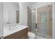 Modern bathroom with sleek vanity, rectangular sink, and glass-enclosed shower with gray subway tile surround at 2531 High Brow St # 41, Duluth, GA 30096
