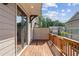 Inviting wood deck showcases an elegant home exterior, a serene outdoor retreat overlooking other homes at 2531 High Brow St # 41, Duluth, GA 30096