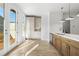 Modern kitchen with stainless steel appliances, large island, and access to the deck at 2531 High Brow St # 41, Duluth, GA 30096