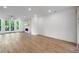 Elegant living space with hardwood floors, recessed lighting, and fireplace feature at 2531 High Brow St # 41, Duluth, GA 30096