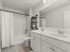 Bathroom with double sink vanity, white cabinets, and modern fixtures at 339 Garnet Dr, Acworth, GA 30101