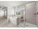 Bathroom featuring a tiled shower, soaking tub and a neutral color palette at 339 Garnet Dr, Acworth, GA 30101