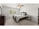 Bedroom with plush carpet, a ceiling fan, and a window with blinds at 339 Garnet Dr, Acworth, GA 30101