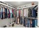 Walk-in closet with ample shelving and hanging space at 339 Garnet Dr, Acworth, GA 30101