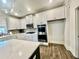 Modern kitchen featuring stainless steel appliances and an island with quartz countertops at 339 Garnet Dr, Acworth, GA 30101