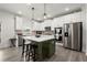 Beautiful kitchen featuring stainless steel appliances, a large island, and modern lighting at 339 Garnet Dr, Acworth, GA 30101