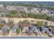 Aerial view of homes in a neighborhood with golf course at 3795 Greenside Ct, Dacula, GA 30019