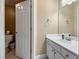 Small bathroom with vanity and toilet at 3795 Greenside Ct, Dacula, GA 30019