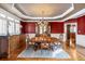 Formal dining room with hardwood floors and chandelier at 3795 Greenside Ct, Dacula, GA 30019