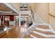 Two-story entryway with hardwood floors and staircase at 3795 Greenside Ct, Dacula, GA 30019