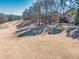 View of golf course with houses in background at 3795 Greenside Ct, Dacula, GA 30019