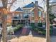 Brick house back with screened porch, deck, and landscaped yard at 3795 Greenside Ct, Dacula, GA 30019