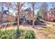 Brick house with a large deck and backyard at 3795 Greenside Ct, Dacula, GA 30019