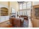 Living room with stone fireplace and hardwood floors at 3795 Greenside Ct, Dacula, GA 30019