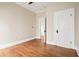 Bedroom with hardwood floors and classic white trim at 536 Moreland Ne Ave, Atlanta, GA 30307