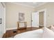 Bedroom featuring a bed, hardwood floors, art, and open closet at 536 Moreland Ne Ave, Atlanta, GA 30307