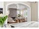 Open kitchen view flowing into a sunlit living area with stylish decor at 536 Moreland Ne Ave, Atlanta, GA 30307