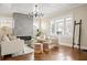 Bright and airy living room with a contemporary fireplace, stylish furniture, and ample natural light at 536 Moreland Ne Ave, Atlanta, GA 30307