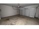 An empty two car garage with automatic door and concrete flooring at 7540 Knoll Hollow Rd, Lithonia, GA 30058