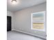 Neutral bedroom with carpet, a window for natural light, and closet at 202 Scenic View, Carrollton, GA 30116