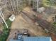 Aerial view showing house, deck, and expansive backyard at 4045 High Gables E, Cumming, GA 30041