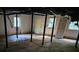 Unfinished basement with windows, support beams, and concrete flooring at 1825 Wellbourne Ne Dr, Atlanta, GA 30324