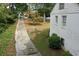 A charming house with a long driveway and mature trees at 1825 Wellbourne Ne Dr, Atlanta, GA 30324